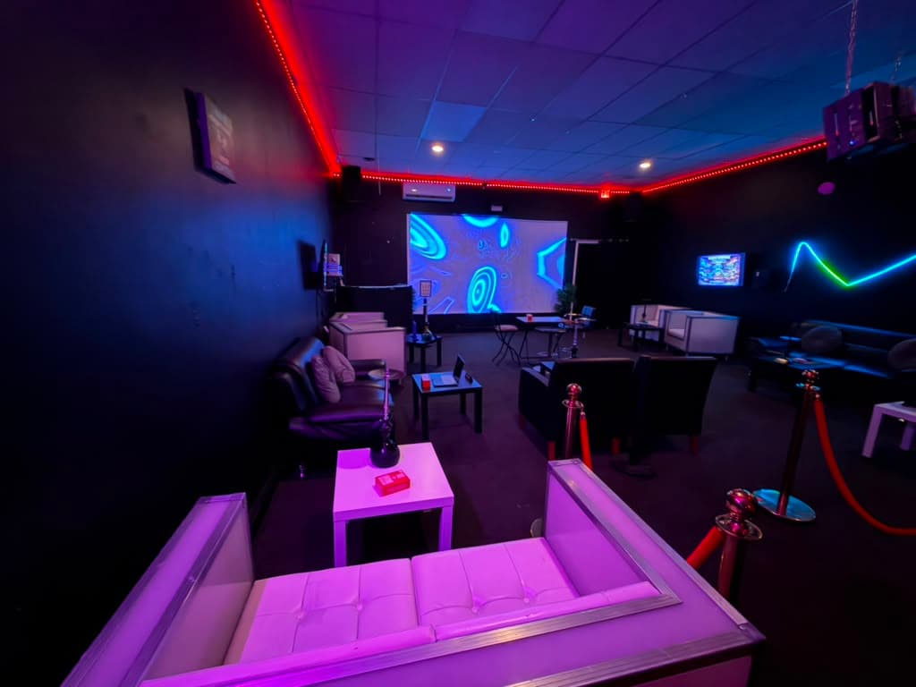 The wall-length projector screen at Saan Gaming Lounge.